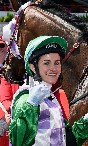Aboard 100-1 shot, Payne becomes first woman to win Australia's richest race